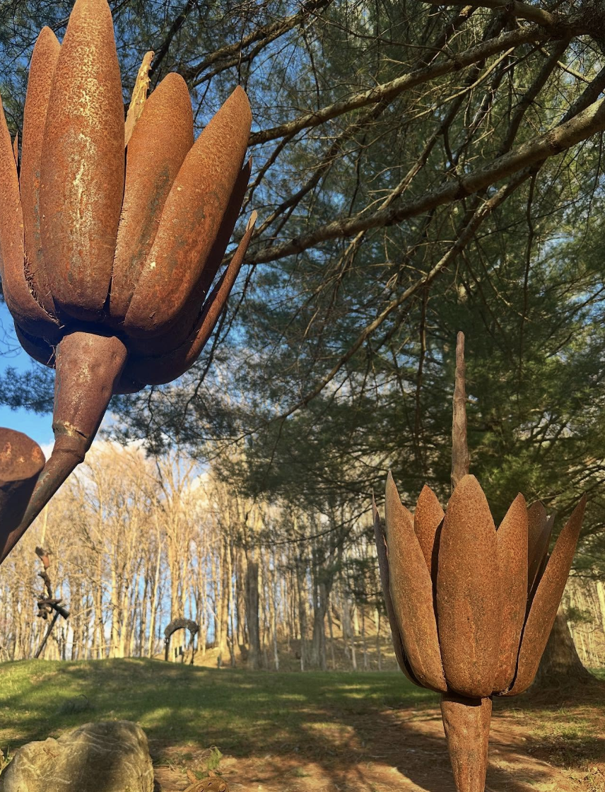 RUST BLOOMS — Weathered steel · garden sculpture
